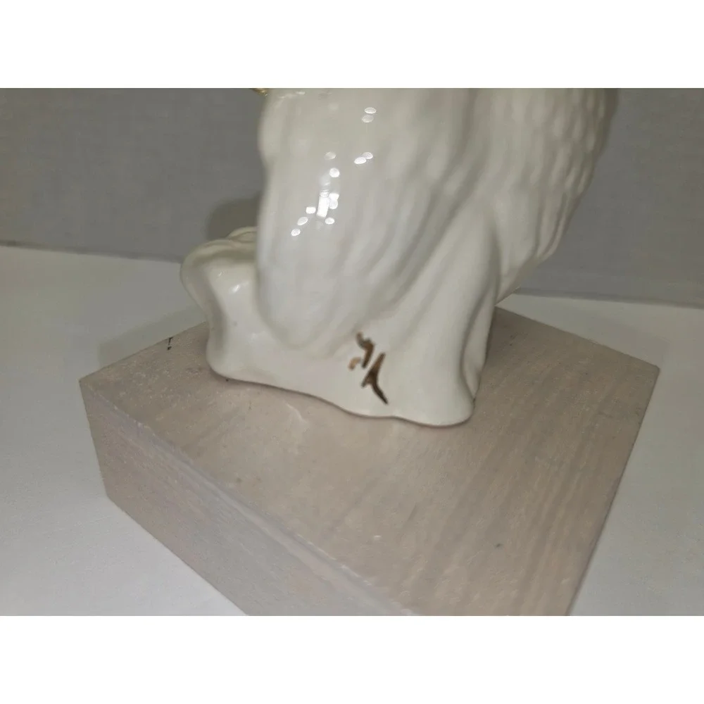 vintage‎ white porcelain angel figurine with gold accents signed